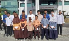 Pemko Bersama BAZNAS Bukittinggi Serahkan Zakat Kepada 562 Siswa SD dan SLTP Se Kota Bukittinggi