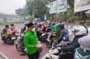 Ketua DPW PKB sumbar Firdaus turun langsung bagikan masker kepada pengguna jalan di jalan Sudirman kamis( 22/10/2026